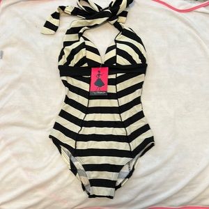 Unique vintage one piece black and white striped one piece swimsuit.